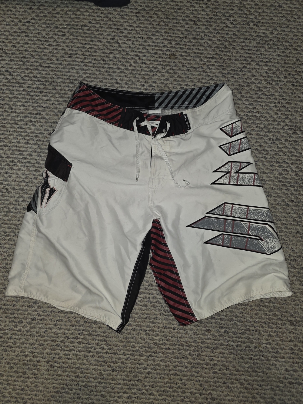 Volcom White Swim Boardshorts with Black and Red Accents